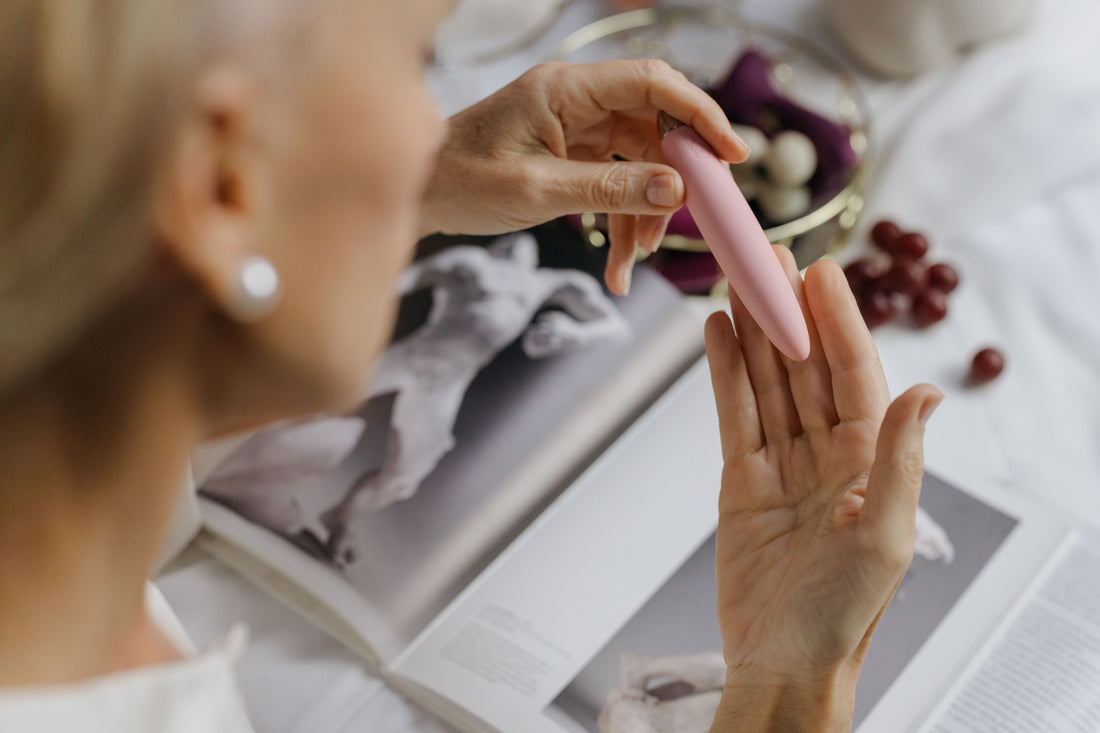 Discreet vibrator held by woman showcasing modern design and changing perceptions of pleasure devices