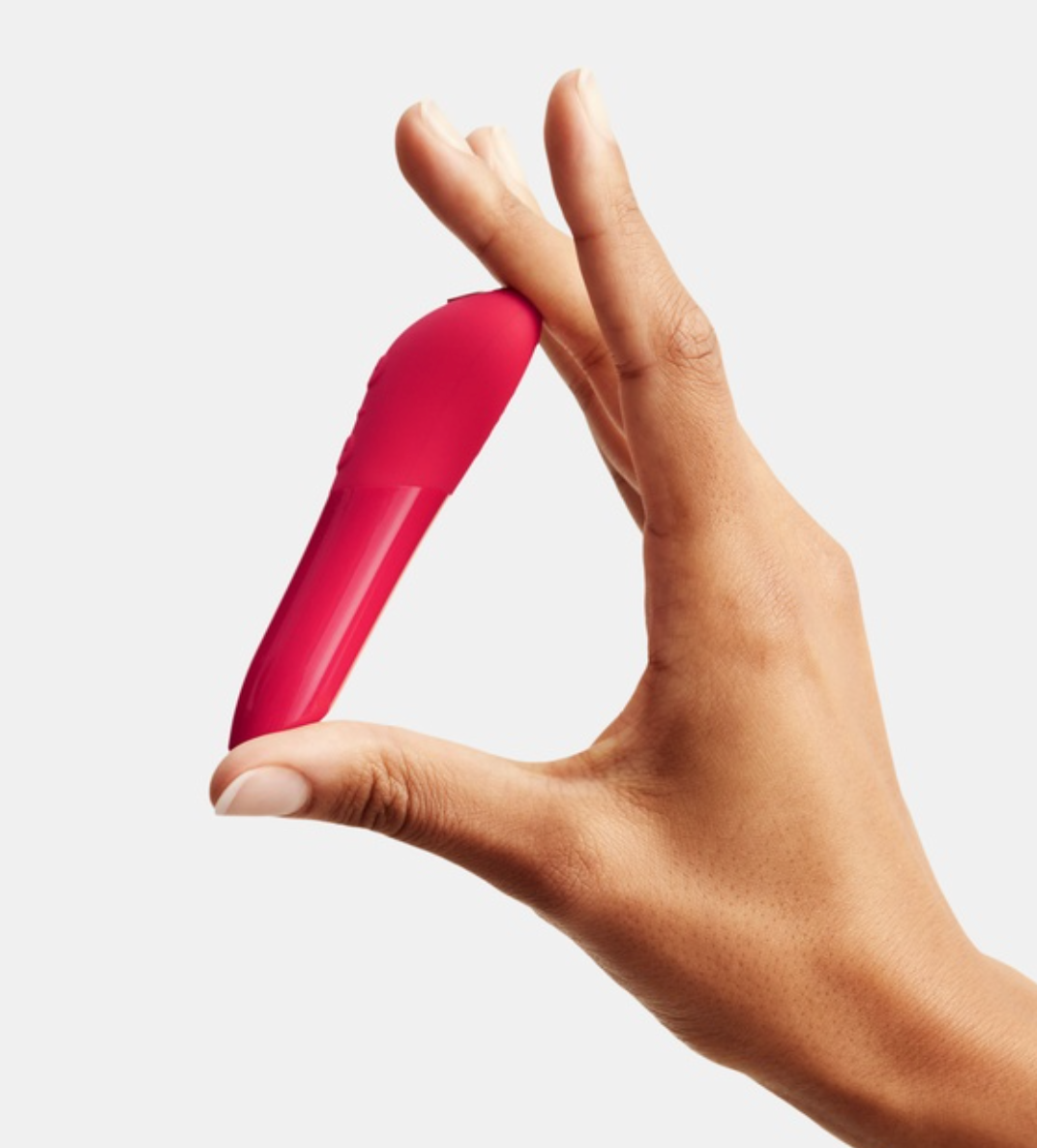 User Holding We-Vibe Tango X Bullet Vibrator for Scale